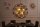 Ronde lampe à suspendre boule verre métal 5-flamme en or