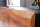Buffet en bois dacacia fer 180 cm piètement à patins bord darbre
