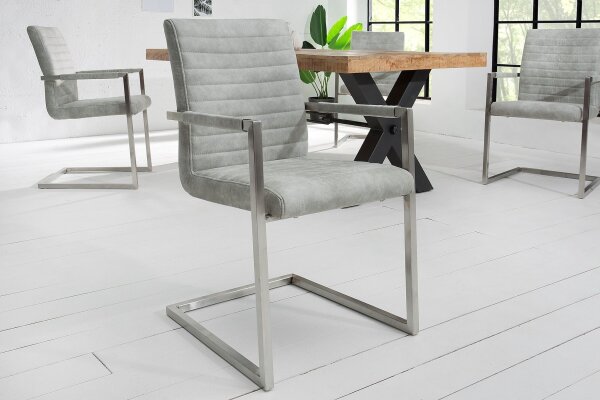 Chaise à piétement luge avec accoudoirs Tissu Acier inoxydable Gris Chrome