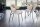 Esszimmerstuhl Retro aus Bouclé Metall in Greige Schwarz
